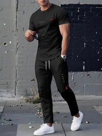 Conjunto de duas peças composto por camiseta de gola careca respirável e calça *oversized* de pernas largas.