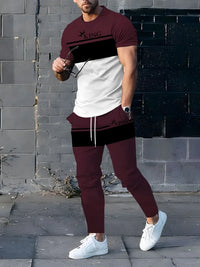 Conjunto de duas peças composto por camiseta de gola careca respirável e calça *oversized* de pernas largas.
